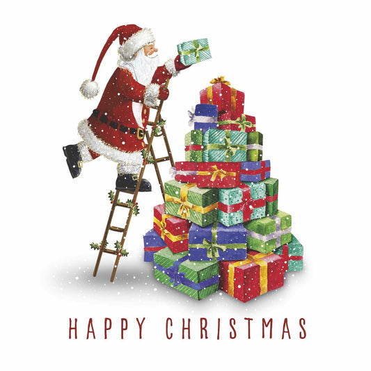 Santa on a holly adorned wooden ladder, placing the final gift at the top of a large pile of colourful presents. Snow is falling. Text at the bottom of the illustration reads "Happy Christmas".